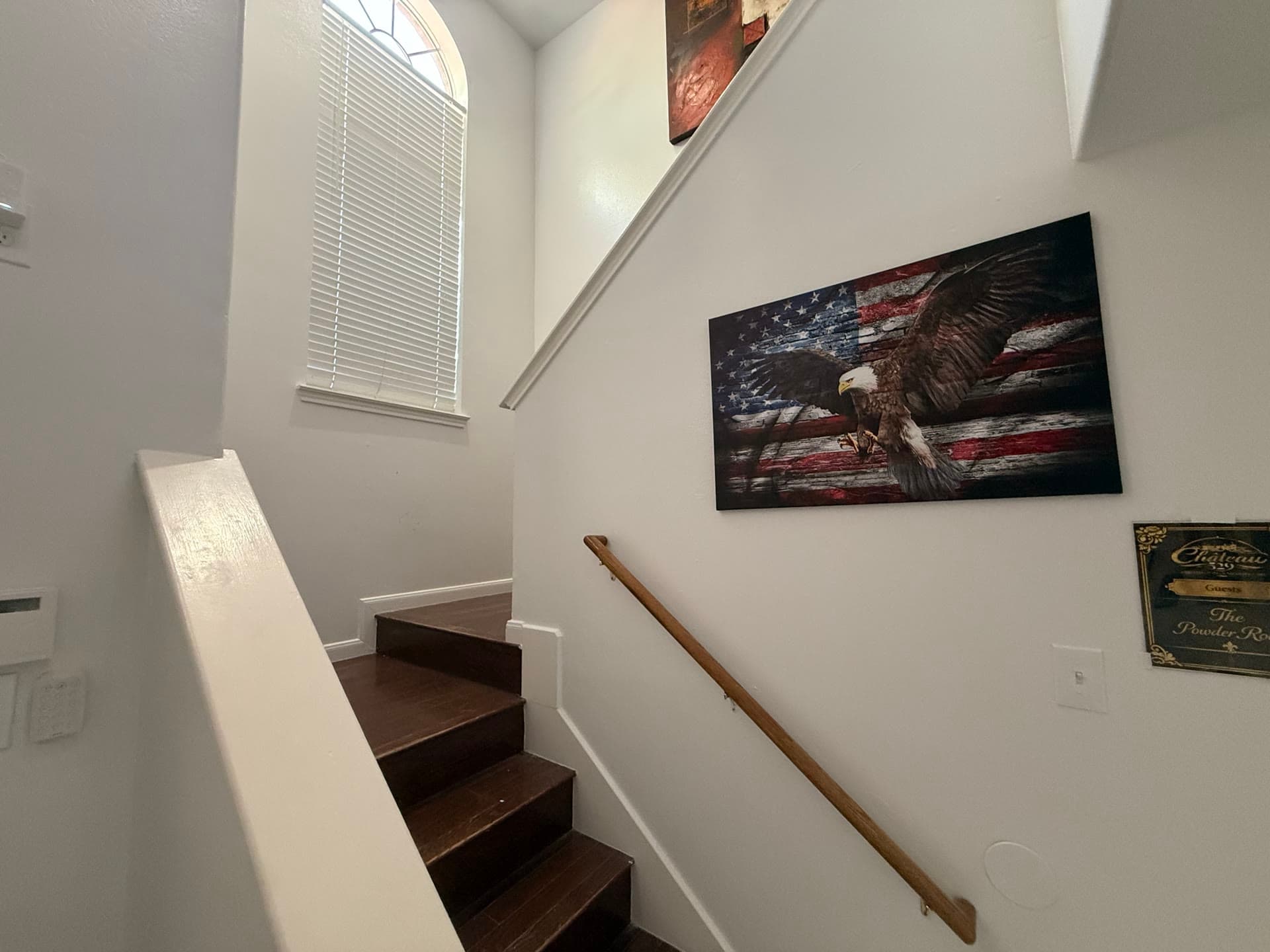 Stairway with American eagle art and handrail